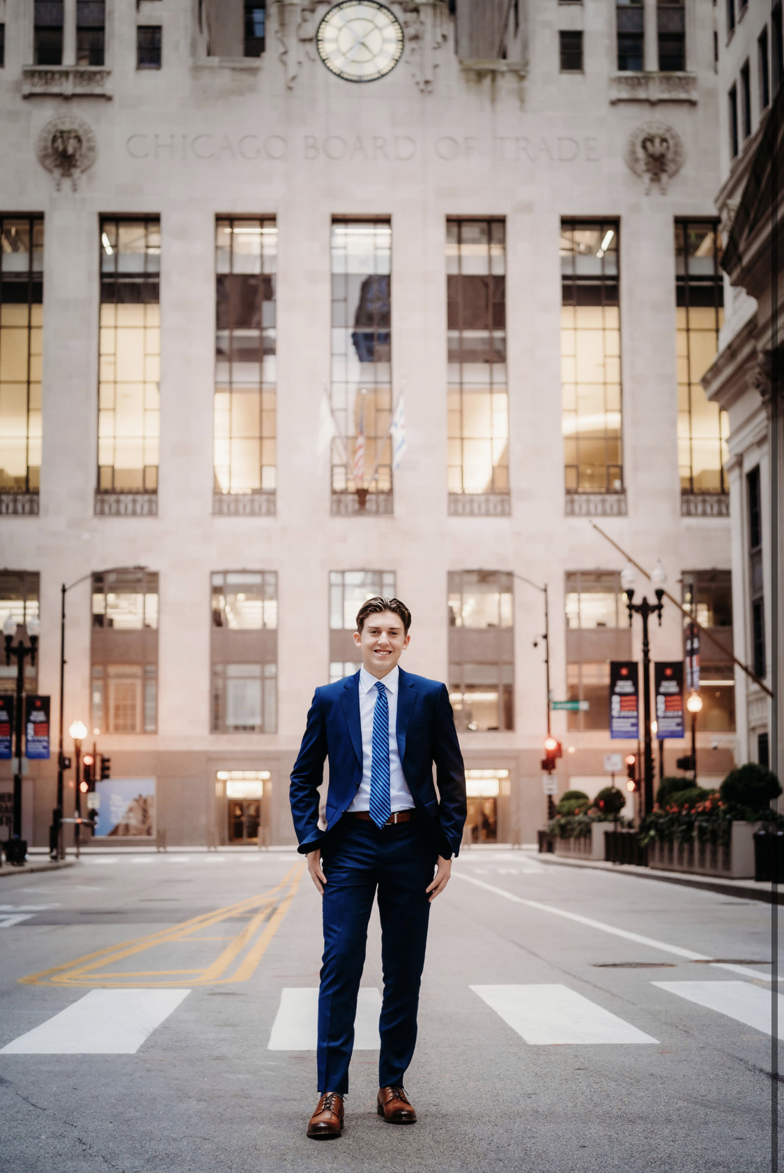 Carson Gelatka standing on LaSalle Street in front of the Chicago Board of Trade building